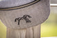 Riding waist bag with adjustable removable strap for keeping essentials close while in the saddle.