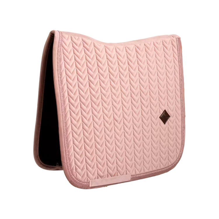 Elegant dressage saddle pad with pearls for a sophisticated competition look.