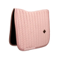 Elegant dressage saddle pad with pearls for a sophisticated competition look.