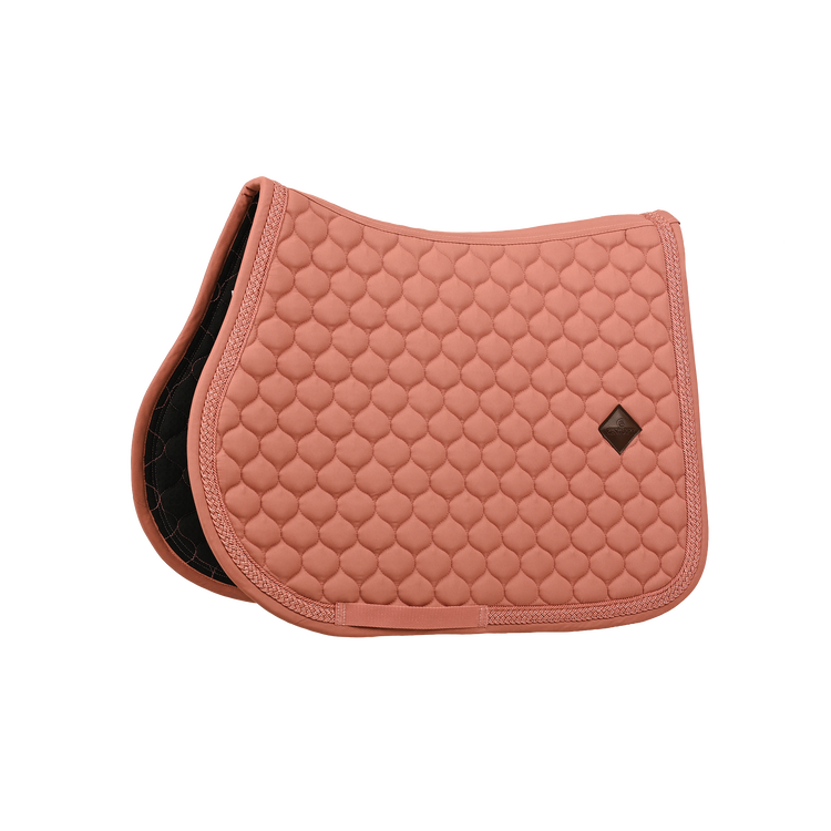 Elegant onion quilted saddle pad designed to help protect against friction