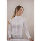 Elegant white equestrian show shirt for women riders.