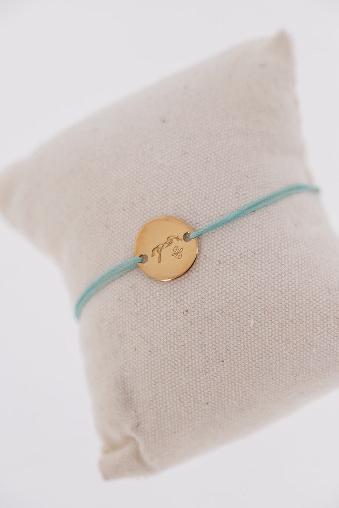 Equestrian cord bracelet for women with a subtle horse-inspired design.