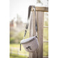 Penelope Chevron shoulder bag with embossed logo and spacious zippered main compartment.