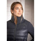 Equestrian quilted jacket with softshell-style sleeves and polyester padding.