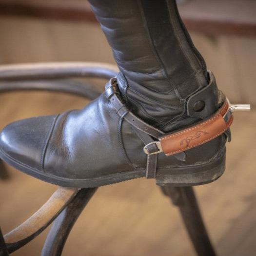 Equestrian spur protectors for improved comfort when wearing spurs.