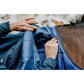 Stable turnout rug with reflective details and secure fit