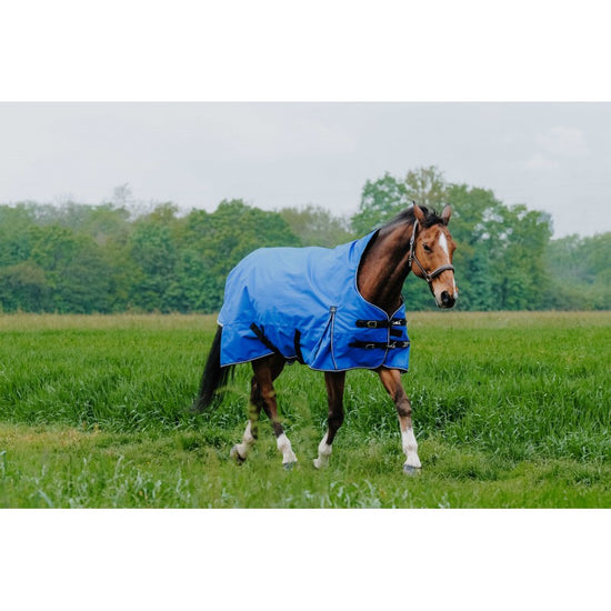 Breathable winter horse rug with reflective tail flap