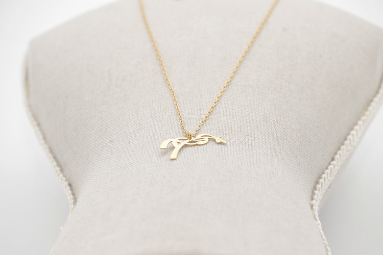 Gold horse pendant necklace with a fine chain for subtle everyday equestrian style.