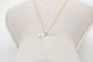 Gold horse pendant necklace with a fine chain for subtle everyday equestrian style.