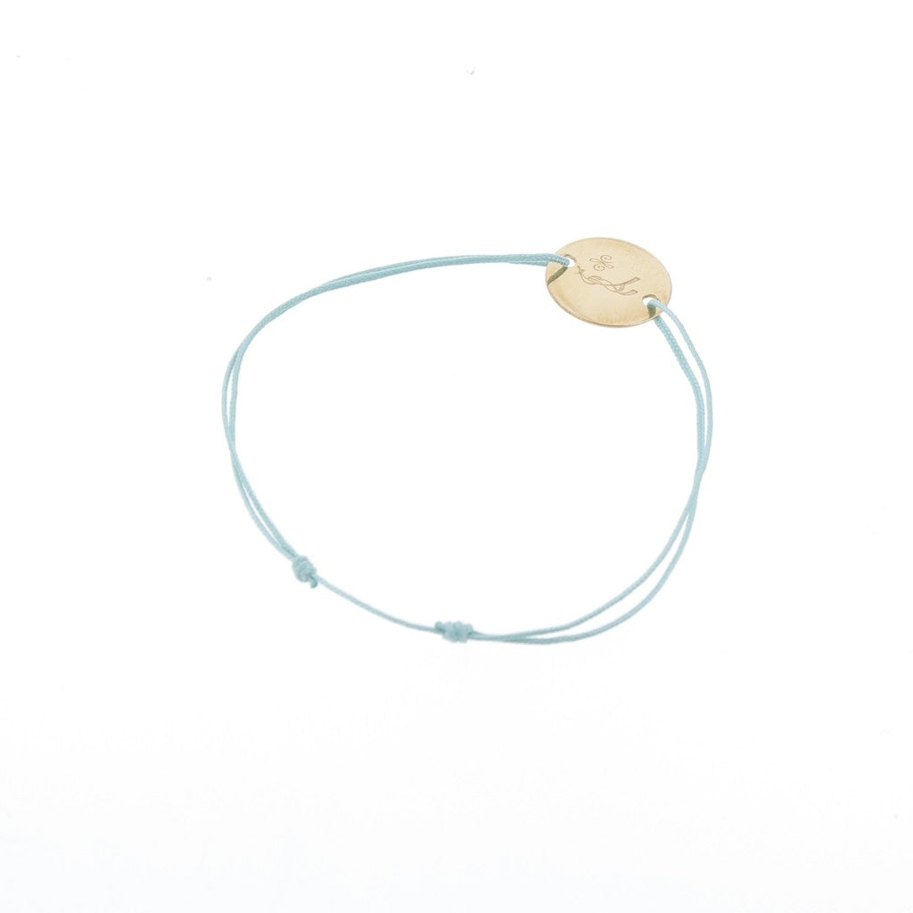 Gold-plated horse bracelet with delicate cord for everyday equestrian style.