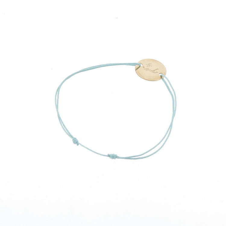 Gold-plated horse bracelet with delicate cord for everyday equestrian style.