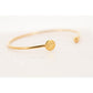 Penelope Collection gold bracelet with signature horse motif and minimalist design.