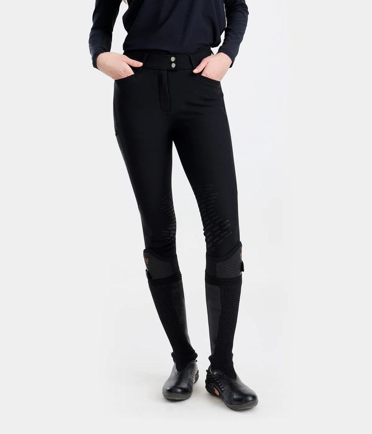 Horse Pilot Laura Kraut breeches offering freedom of movement and comfort.