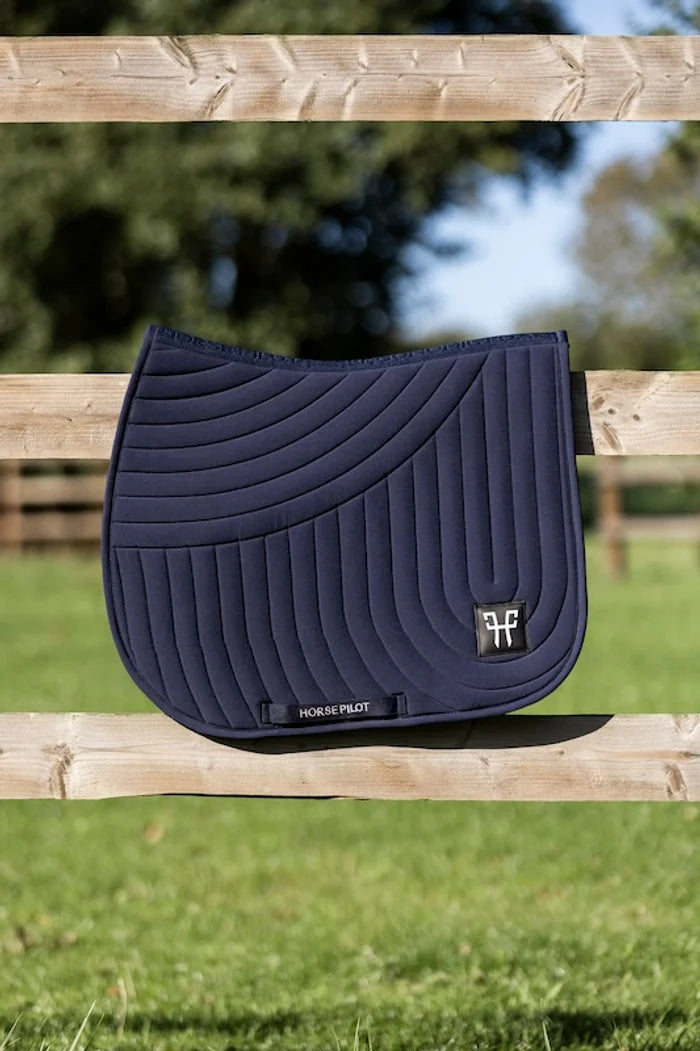 Lightweight jumping saddle pad with shock absorption