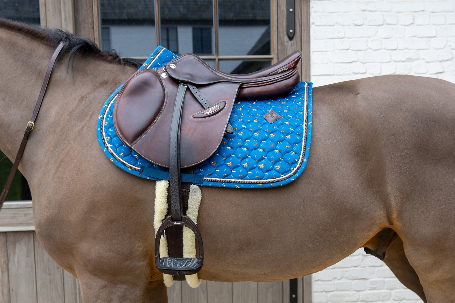 Horse print velvet dressage saddle pad with star quilted design