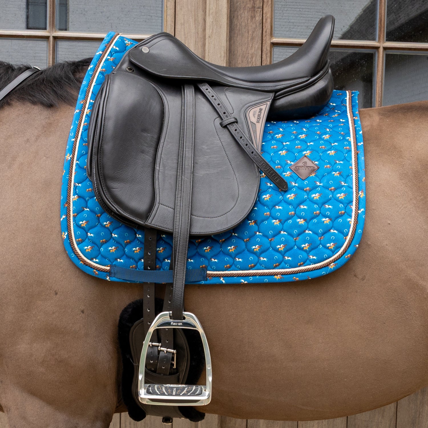 Horse print velvet jumping saddle pad with double twisted piping