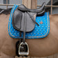 Horse print velvet jumping saddle pad with double twisted piping