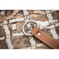 Horse rider keychain with practical double-ring design.