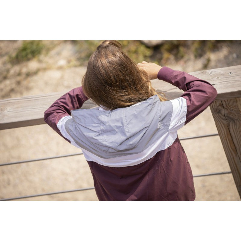 Horse riding windbreaker for women and equestrian activities.