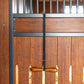 Horse saddle holder with varnished wooden bar for secure saddle support.