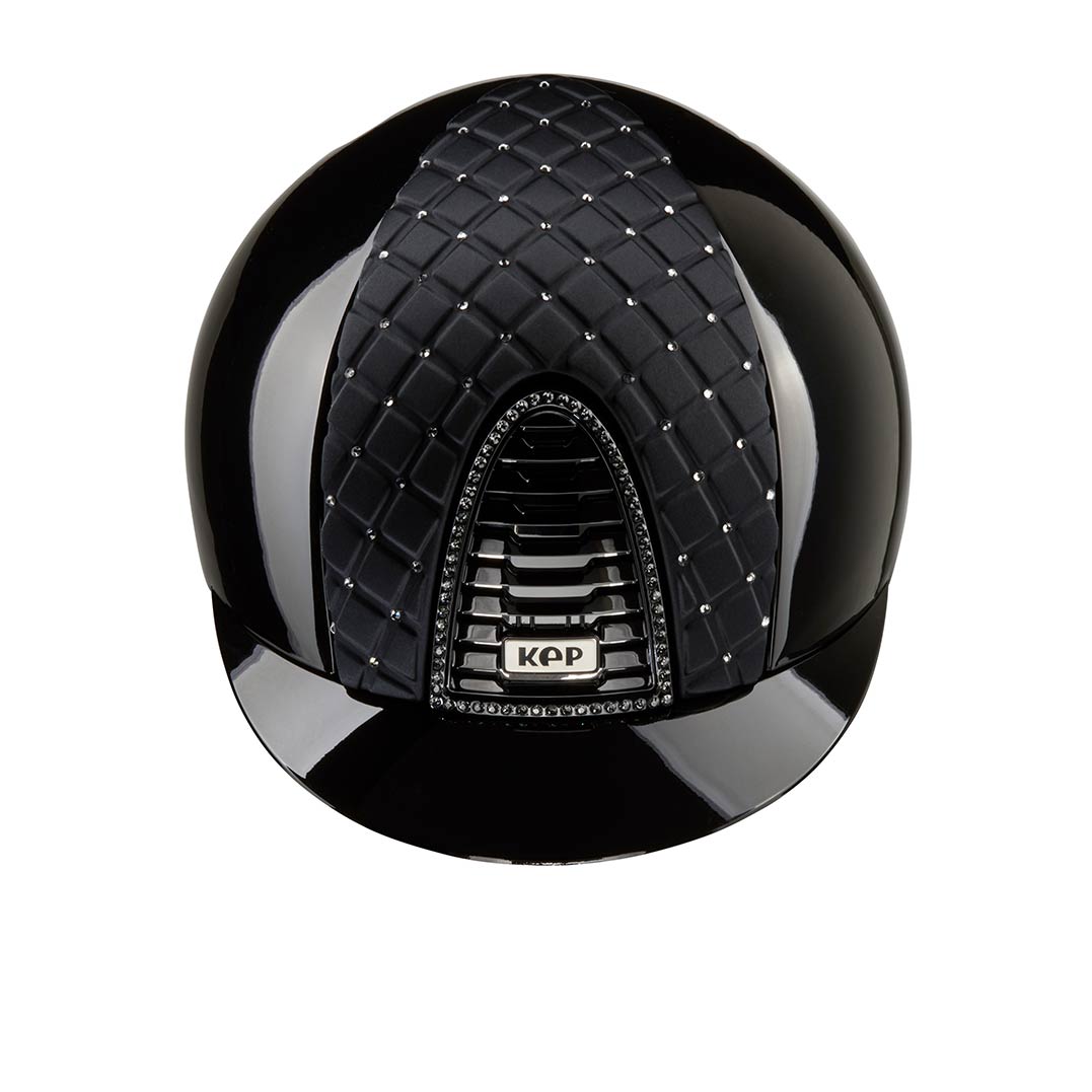 Expensive black horse riding helmet