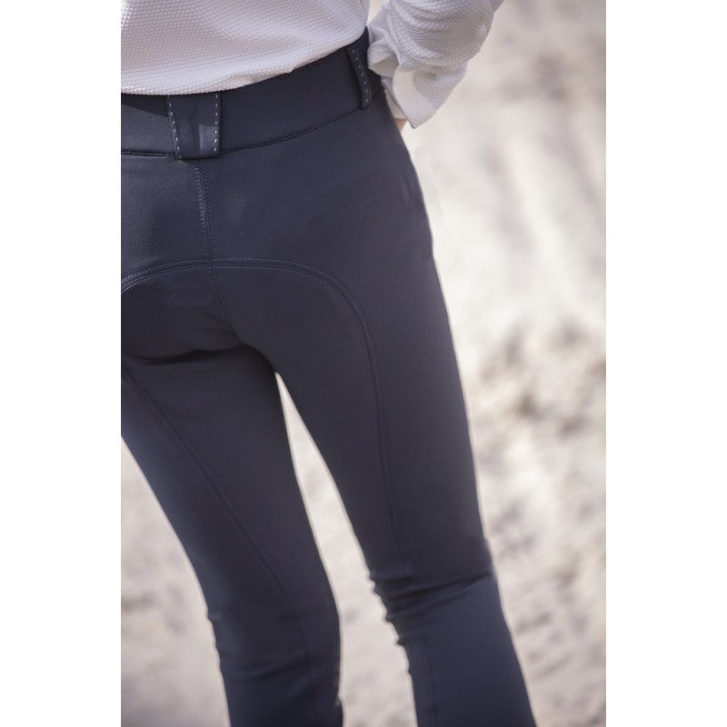 Kids riding breeches with pockets for conveniently carrying small essentials.