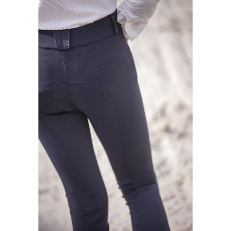 Kids riding breeches with pockets for conveniently carrying small essentials.