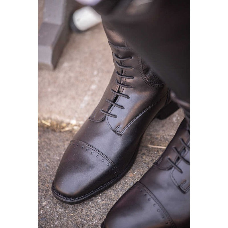 Kids tall riding boots with a comfortable fitted design for everyday equestrian use.