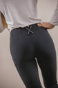 Ladies equestrian breeches with practical pockets and comfortable lower leg design.