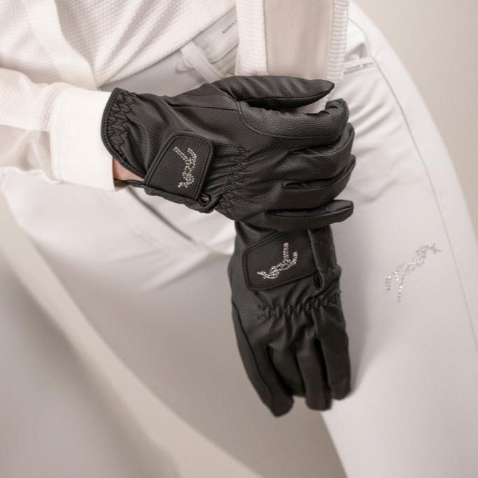 Ladies non-slip riding gloves designed to provide a secure grip on the reins.