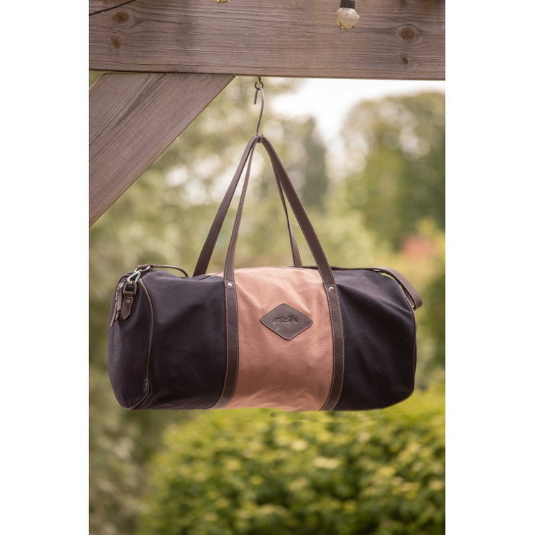 Large equestrian gym bag with practical storage space and secure zip closure.