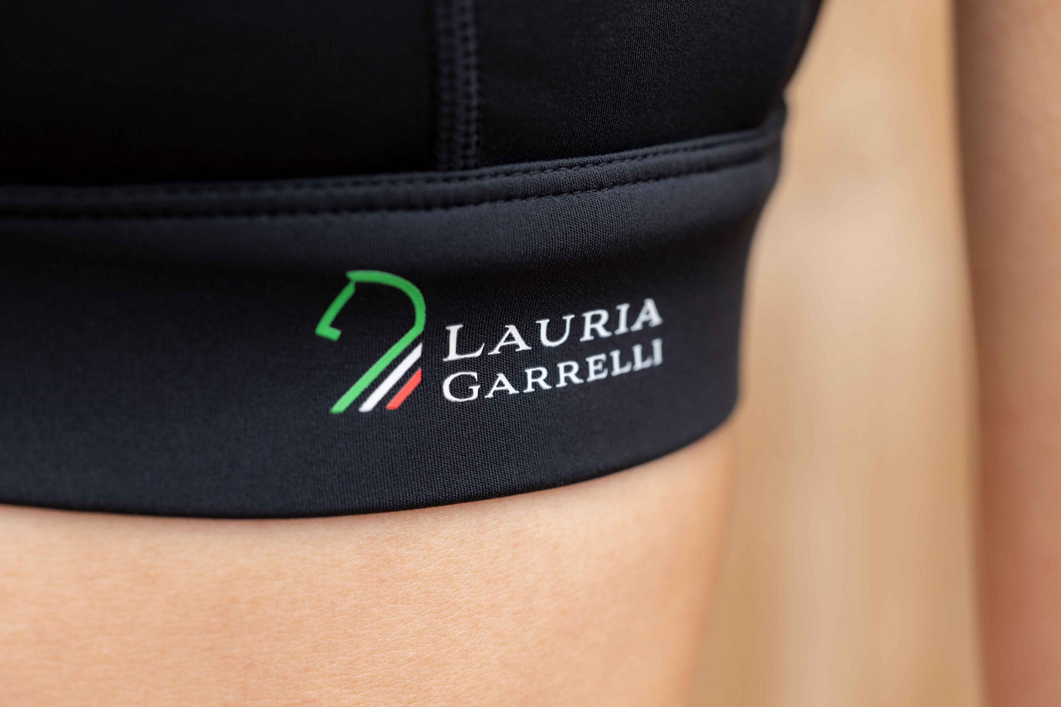 Lauria Garrelli sports bra for equestrian activities.