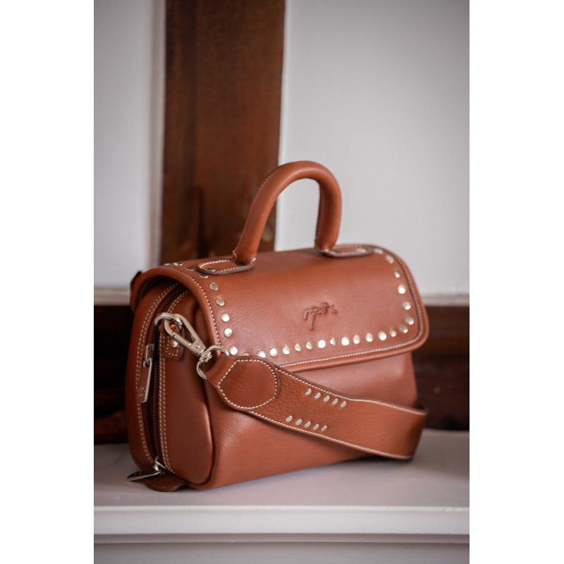 Leather mini bag with decorative metal studs and zip closure