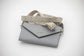 Leather phone bag for riding designed to keep a mobile phone conveniently within reach.
