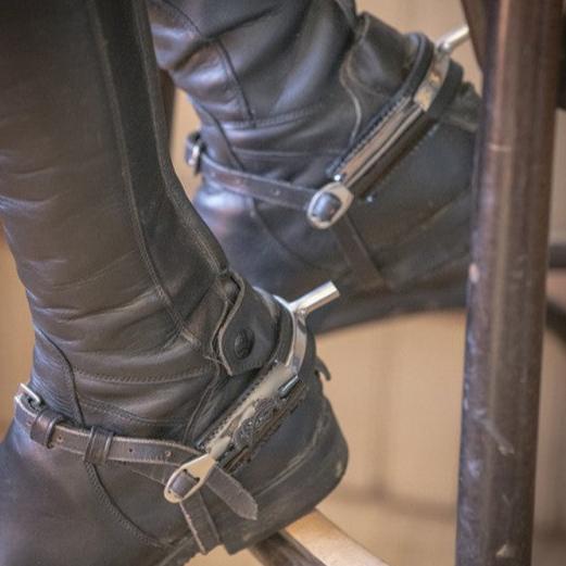 Leather spur covers designed to help protect riding boots during everyday riding.