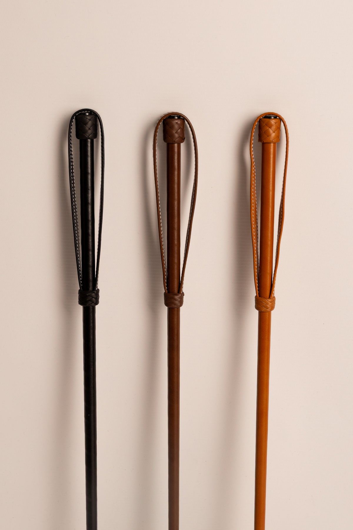 Lightweight jumping whip featuring a comfortable leather knob handle