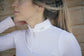 Long sleeve show jumping shirt for women with an elegant fitted look.