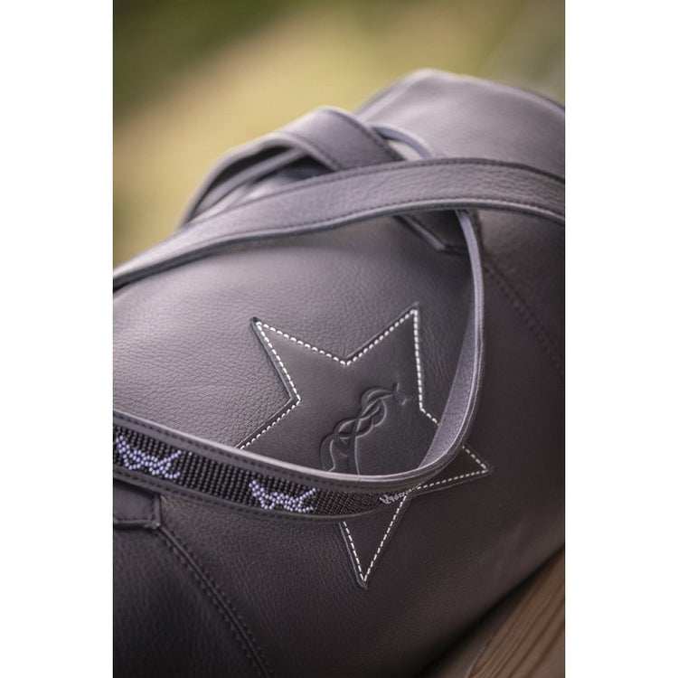 Medium leather weekend bag for short trips and everyday use.