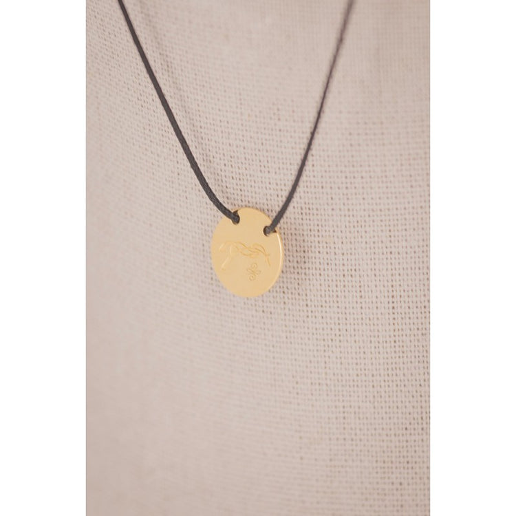 Penelope Adelya pendant necklace with a small round horse logo detail.