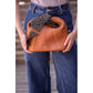Penelope Agathe handbag with embossed logo on the central leather panel