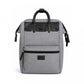 Penelope Backy backpack with embossed logo patch and decorative stitching