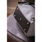 Penelope Backy everyday backpack with decorative saddle-stitched flap