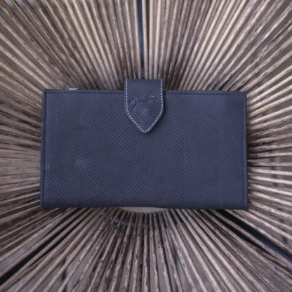 Penelope Bertille leather purse with practical snap button closure.