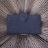 Penelope Bertille leather purse with practical snap button closure.