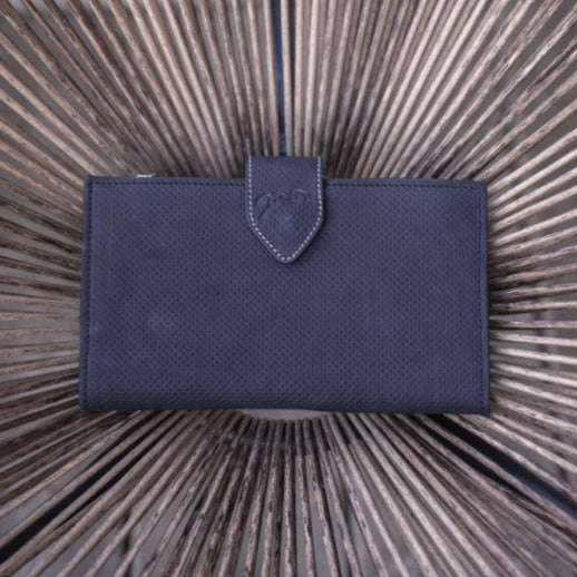 Penelope Bertille leather purse with practical snap button closure.