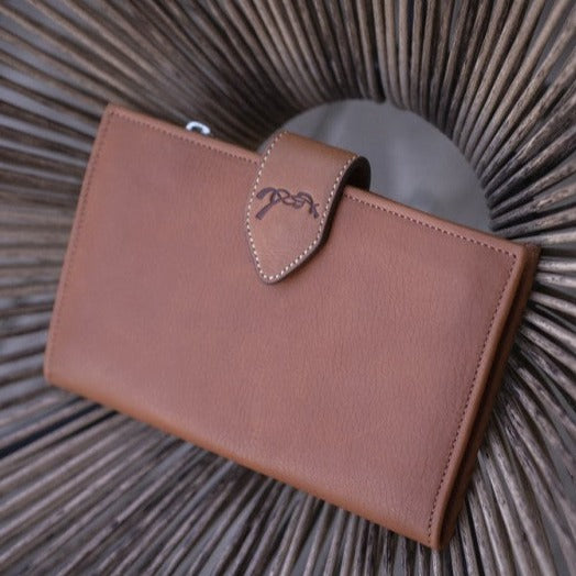 Penelope Bertille leather wallet with three practical storage sections.
