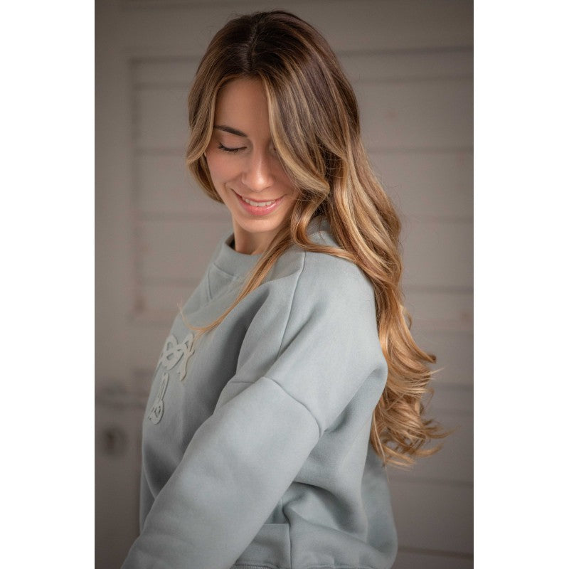 Penelope Bianca equestrian sweatshirt with wide armholes for comfortable freedom of movement.