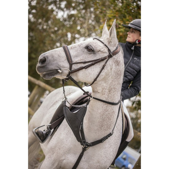 Penelope bib martingale attachment with embossed logo and adjustable buckle.