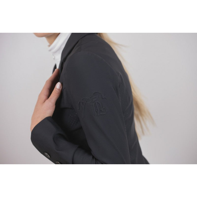 Penelope Calistus stretch riding jacket with perforated side panels for improved ventilation.