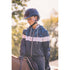 Penelope Celecce lightweight rain jacket with drawstring waist and practical front pockets.